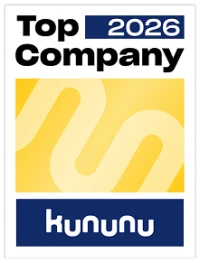Ein Auszeichnungssiegel mit der Aufschrift "Top Company 2026" und dem Logo von Kununu, umrahmt von gelb und blau.